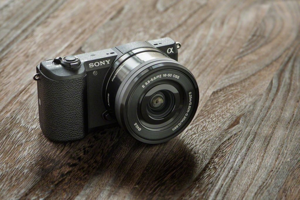 Sony ILCE5100LB.CEC Compact System Camera with 16-50 Lens (24.3 MP, 180 Degrees Tiltable LCD, Fast Hybrid Auto Focus, Noise Reduction Feature, Wi-Fi and NFC) - Black