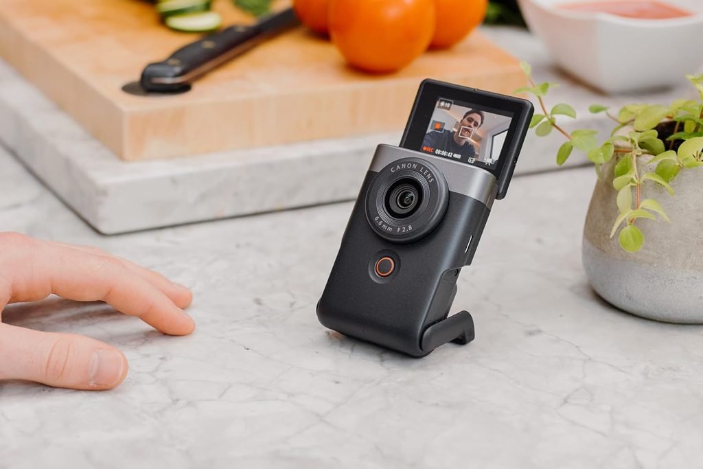 Canon PowerShot V10 Vlogging Starter Kit - Pocket-Sized 4K UHD Vlogging Video Camera - Bluetooth, Wi-Fi - 1-Button, Tilt Screen, Stereo Mics w/Wind Filter - Built-in Multi-position Stand, Black