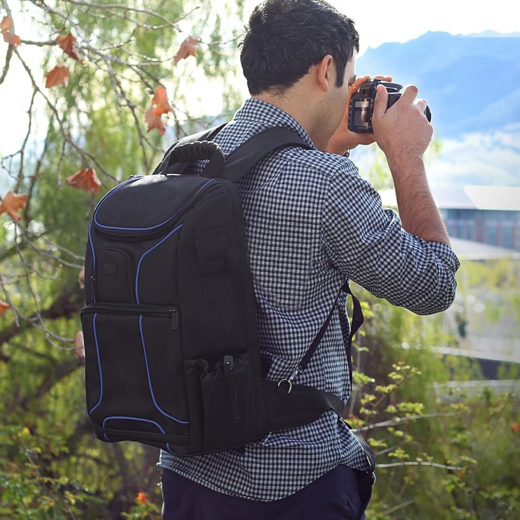 USA Gear Digital Camera Backpack DSLR Photo Bag with Comfort Design, Waterproof Cover, Laptop Storage, Tripod Holder, Adjustable Lens Storage - Compatible with Full-Sized Digital Cameras - Orange